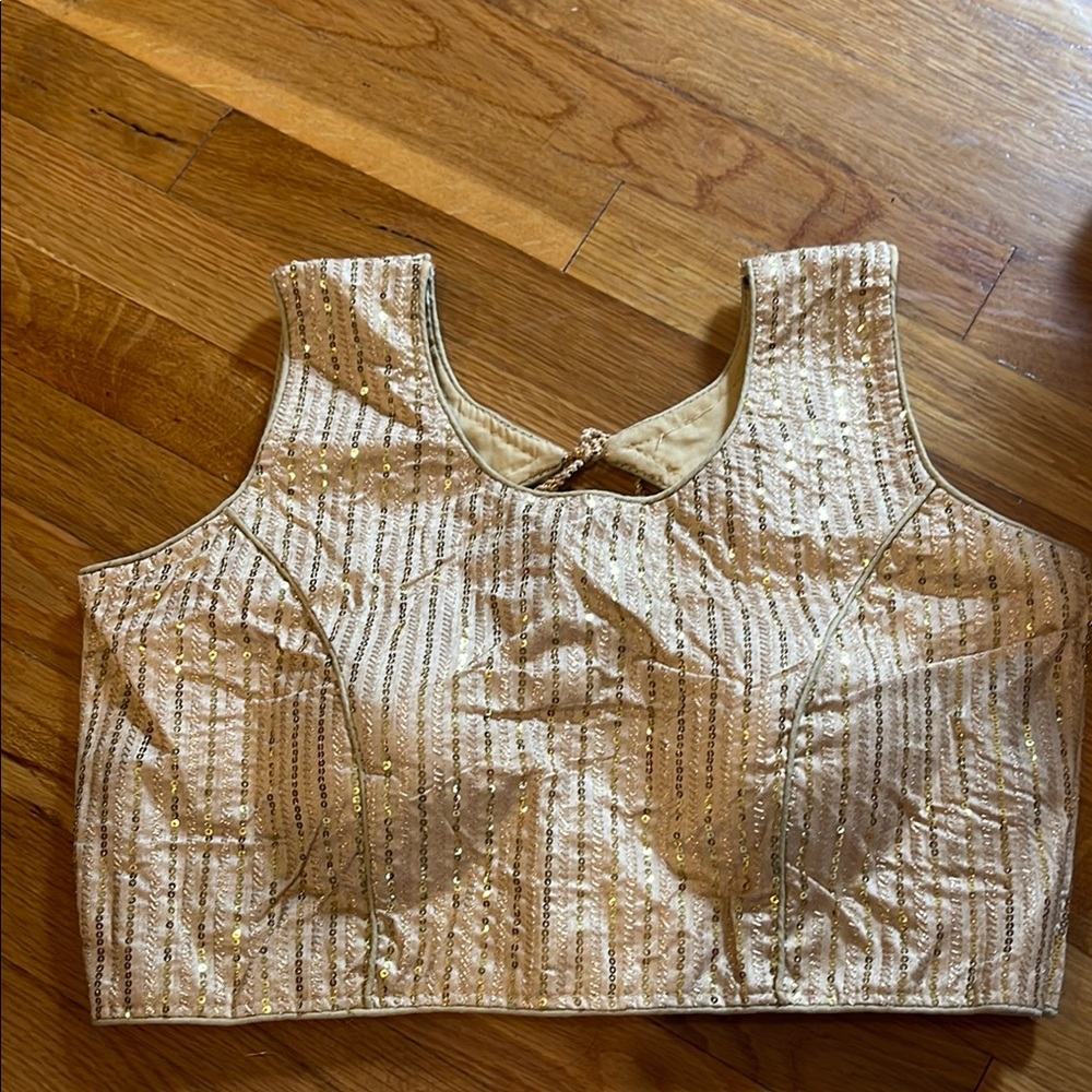 Elegant Gold Sleeveless blouse